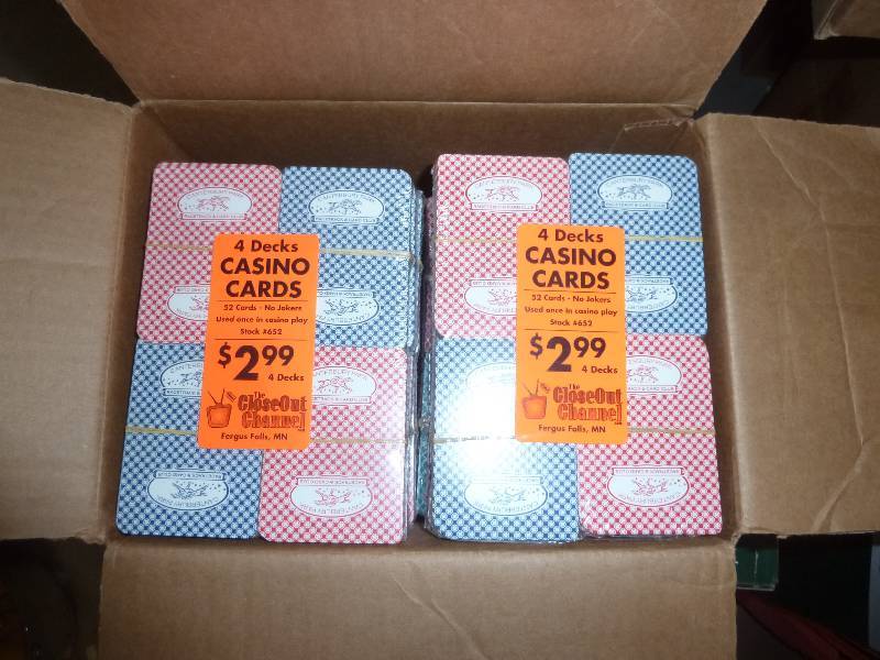 lot 32 image: 77 decks of playing cards packaged ...