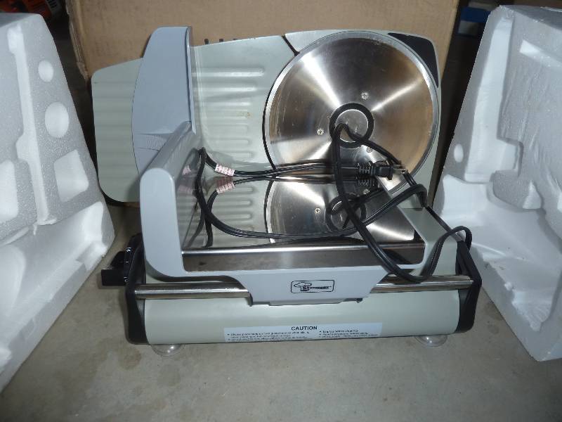 lot 81 image: meat slicer - used - good condition...