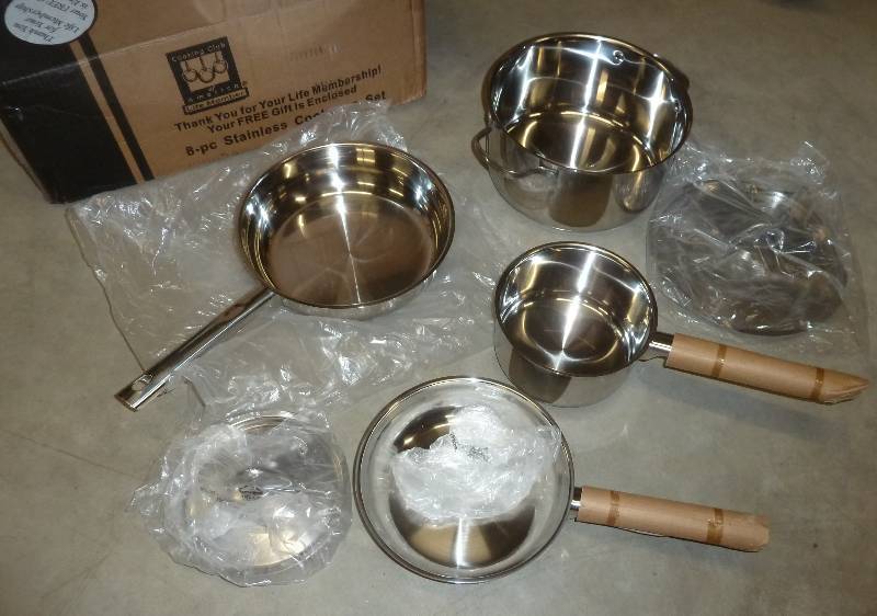 lot 86 image: set of new pots and pans...