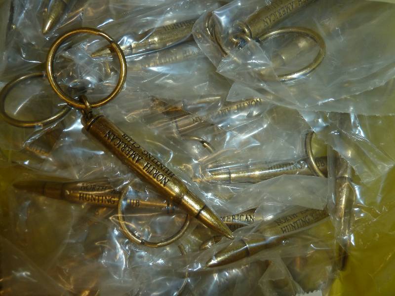 lot 87 image: 46 bullet shaped keychains...