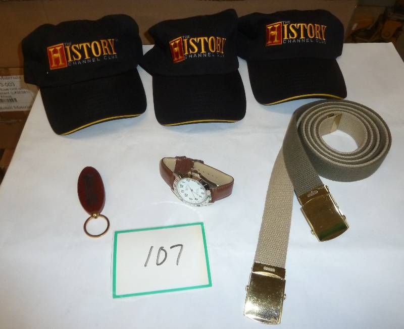 lot 107 image: 3 new History Channel hats, 2 belts...
