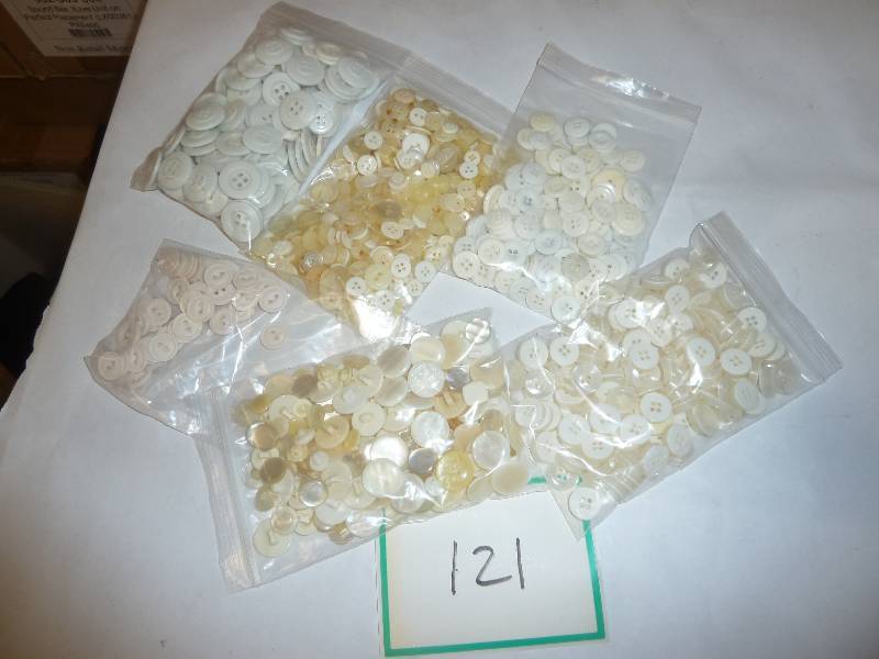 lot 121 image: hundreds of buttons sorted by size ...