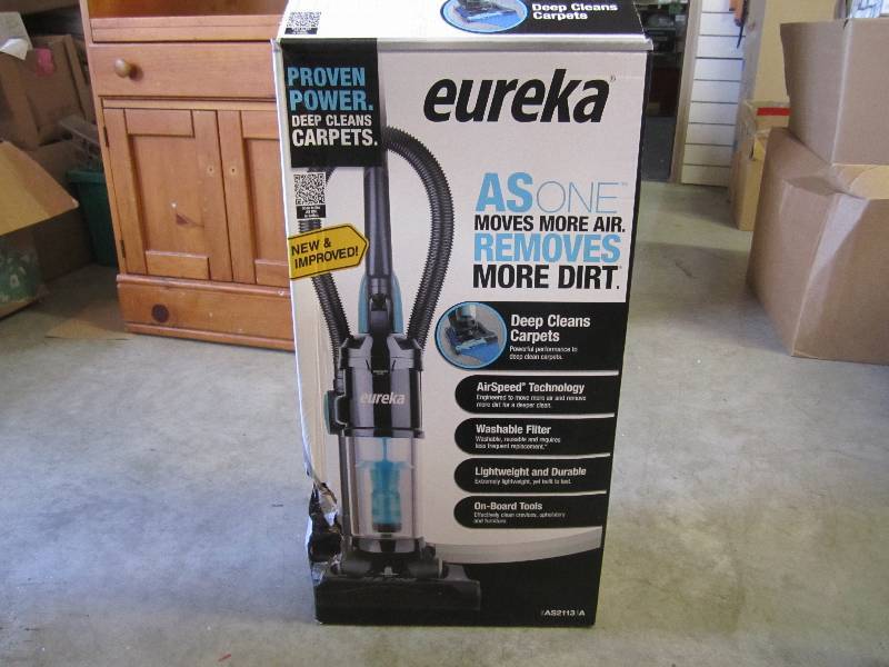 lot 9 image: Eureka upright vacuum cleaner. Open...