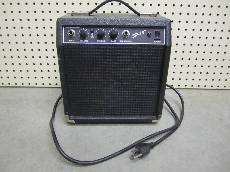 lot 136 image: SP-10 Practice Guitar Amp...