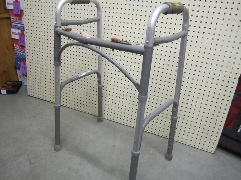lot 147 image: Walker folds for storagetransport....