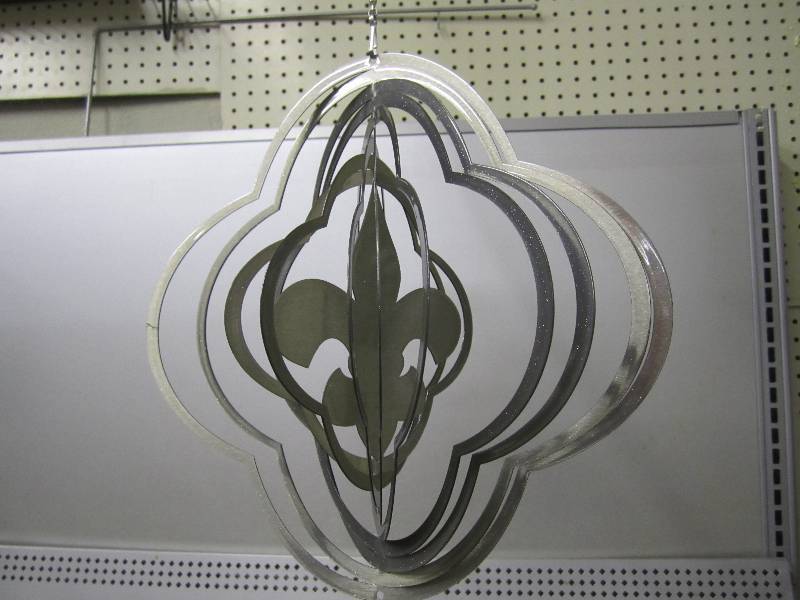 lot 176 image: Metal wind spinner....