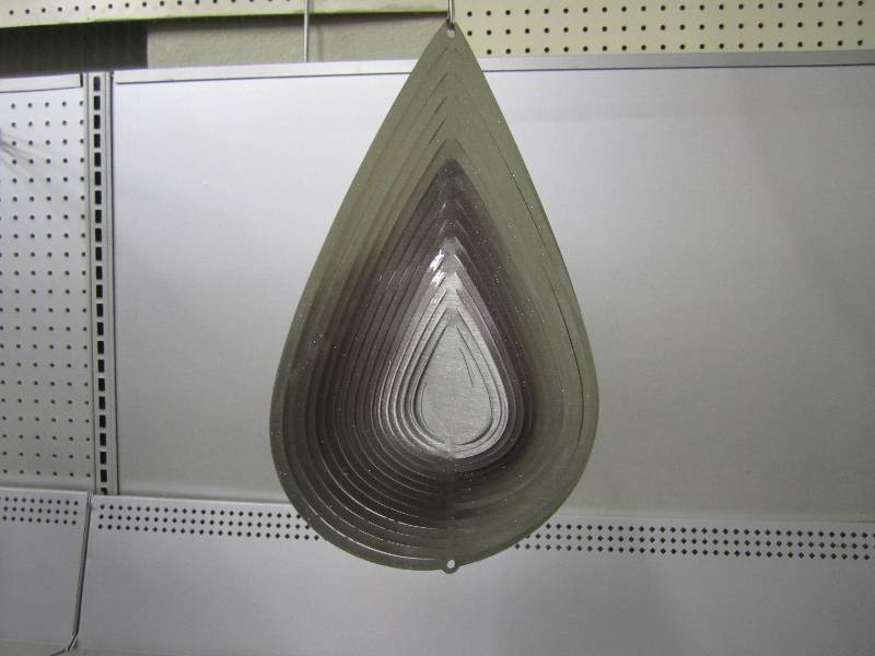 lot 177 image: Metal wind spinner. Tear drop...