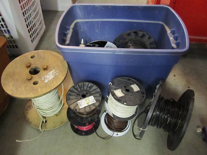 lot 178 image: Tote full of misc rolls of wire. ...