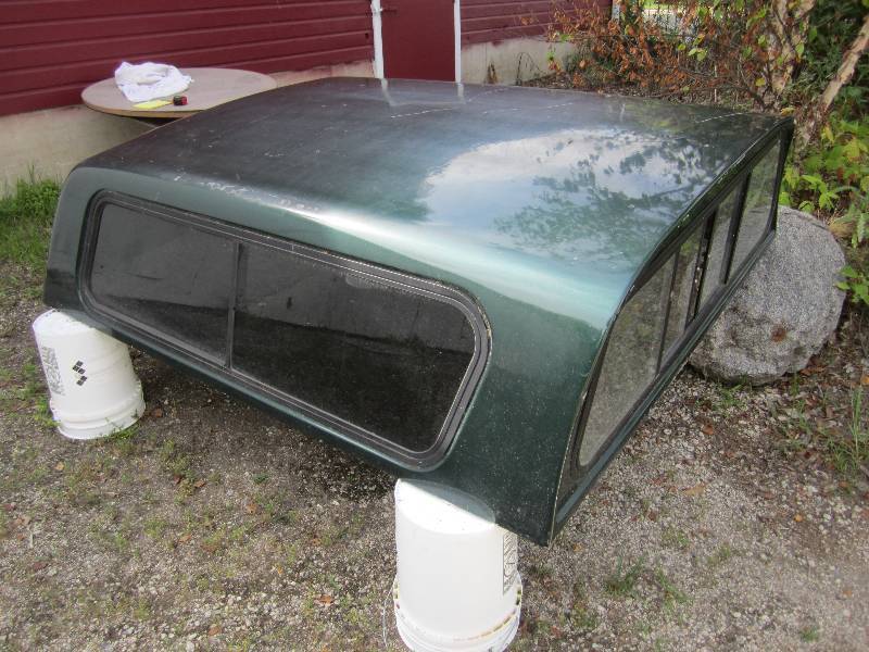 lot 201 image: Raven Fiberglass Truck Topper Shell...