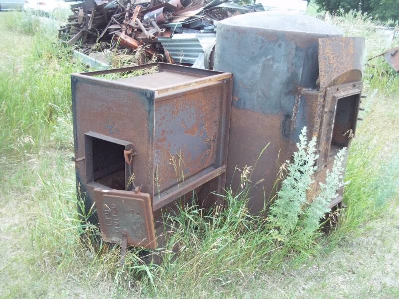 lot 7 image: Pair of wood stoves