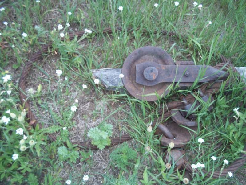 lot 24 image: Stump Puller includes large pulley and cable