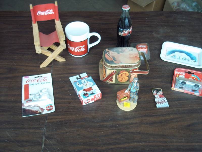 lot 67 image: Lot of Coca Cola Collectibles including Classic bottle, directors chair, mug, etc