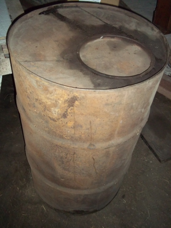 lot 99 image: Metal barrell - full of paint