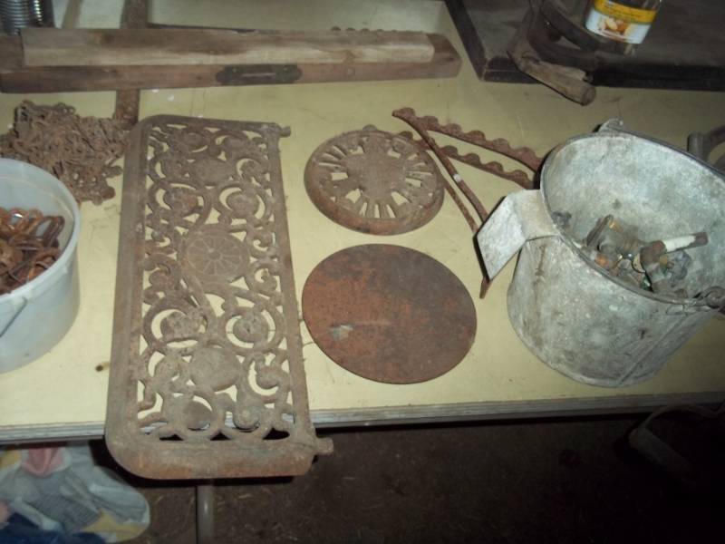 lot 140 image: Lot of Vintage stove parts, car chains, plumbing parts, etc