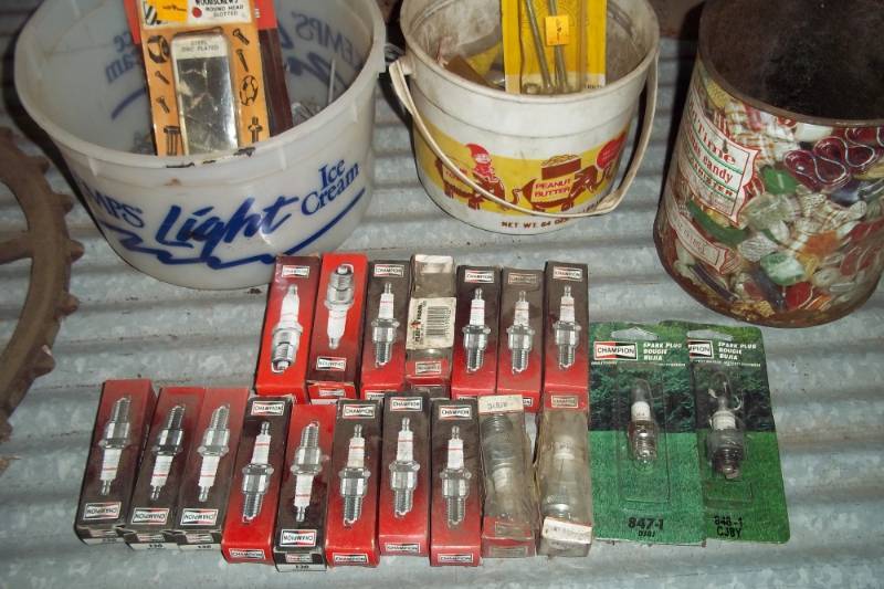 lot 166 image: Lot of 19 spark plugs, hardware, nails, etc