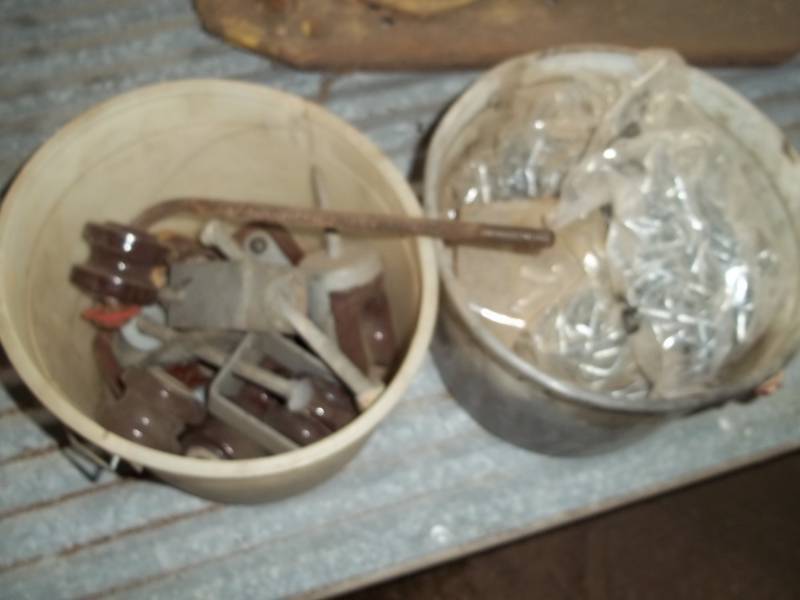 lot 201 image: Lot of fencing supplies including t-post clips and insulators