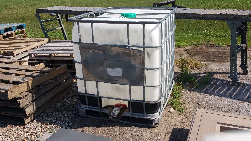 lot 71 image: Mauser 275 Gallon Caged Plastic Tank