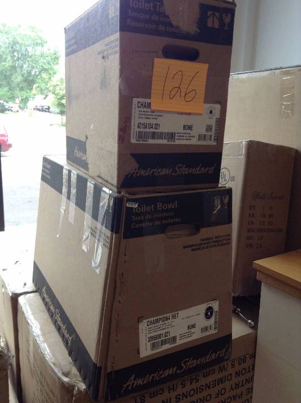 American Standard  Champion 4 HET Chair Height 2-piece 1.28 GPF High-Efficiency Elongated Toilet in Bone open box never used 2 pc