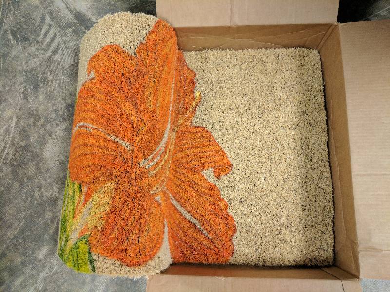 lot 39 image: Entryways Tangerine Lily 35 x 22 Handwoven Coconut Fiber Doormat