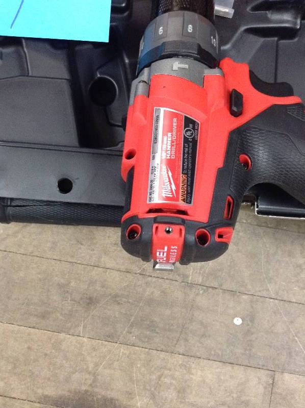 Milwaukee M12 FUEL 12-Volt Brushless 12 in. Hammer Drill and Driver Kit in like New working conditions one battery only