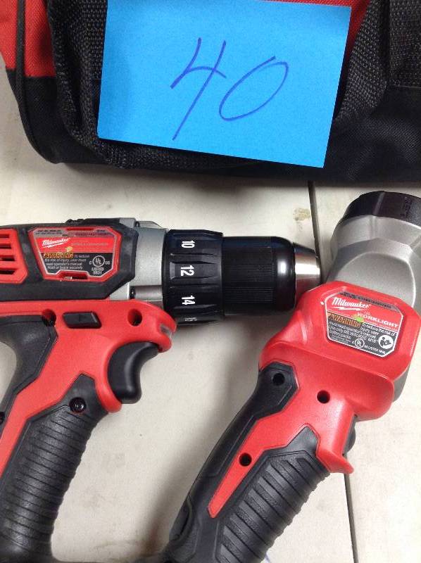 Milwaukee Set of drill driver and light  in like new working conditions Tool Only