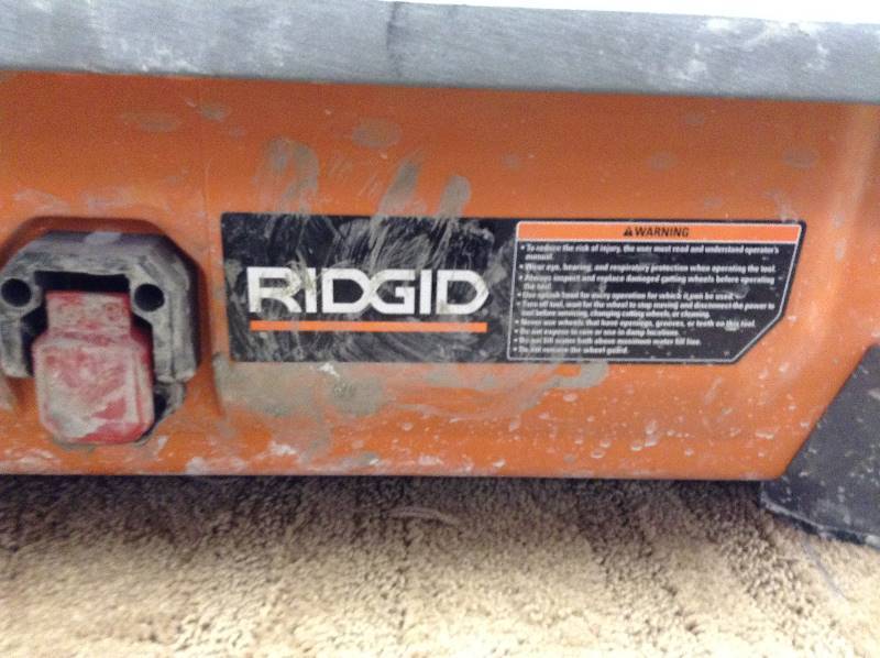 RIDGID  7 in. Job Site Wet Tile Saw used in working conditions