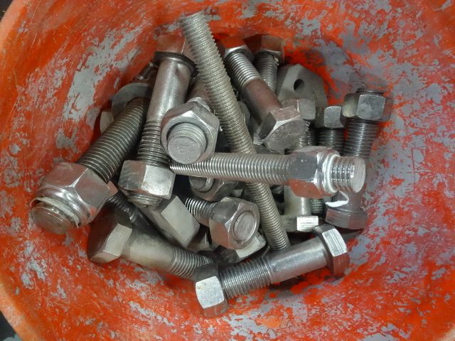 Bucket of large size stainless bolt...