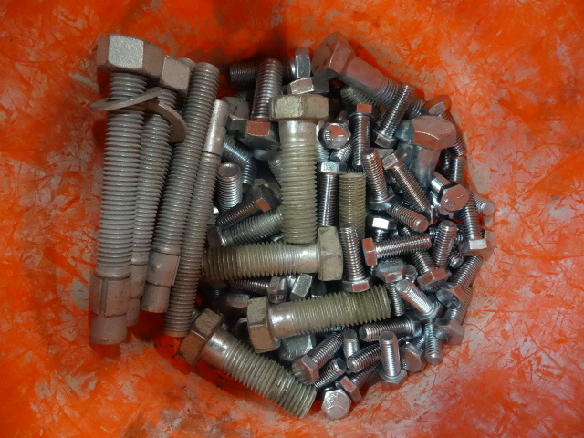 12 a bucket of misc standard bolts...
