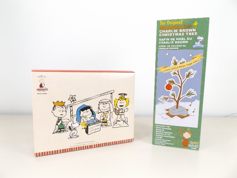 lot 4 image: New in Box Hallmark Peanuts 7 Figurine Nativity Set, and Charlie Brown Musical Christmas Tree