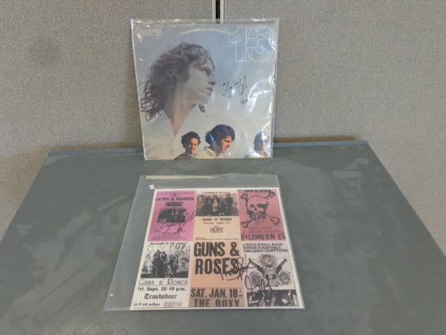 lot 38 image: Autographed Concert Poster and Album
