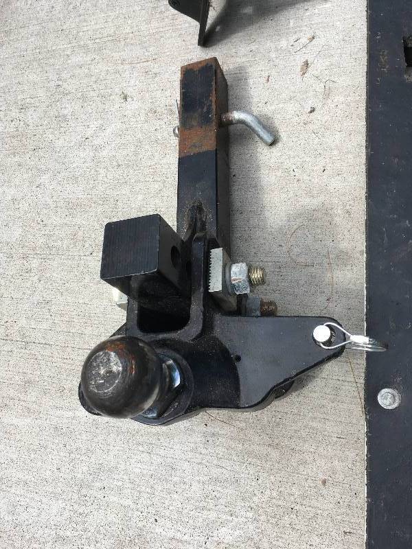 lot 18 image: ADJUSTABLE RECEIVER HITCH WITH STABILIZER BAR AND STONE GUARD PROTECTOR