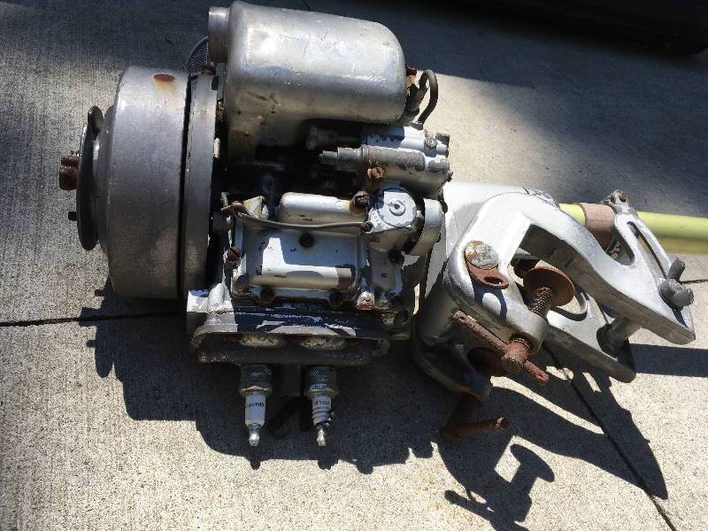 lot 32 image: ANTIQUE JOHNSON BOAT MOTOR