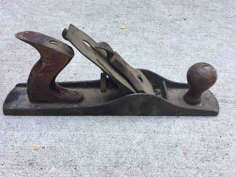 lot 144 image: ANTIQUE PLANE, OIL CAN, AND AXE