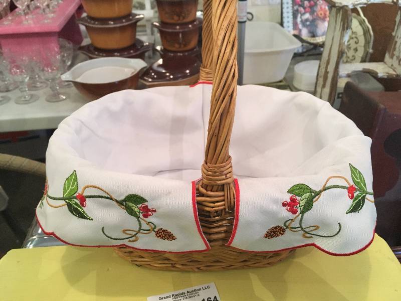 lot 166 image: (6) RED STRIPED PLACE MATS AND WICKER BASKET