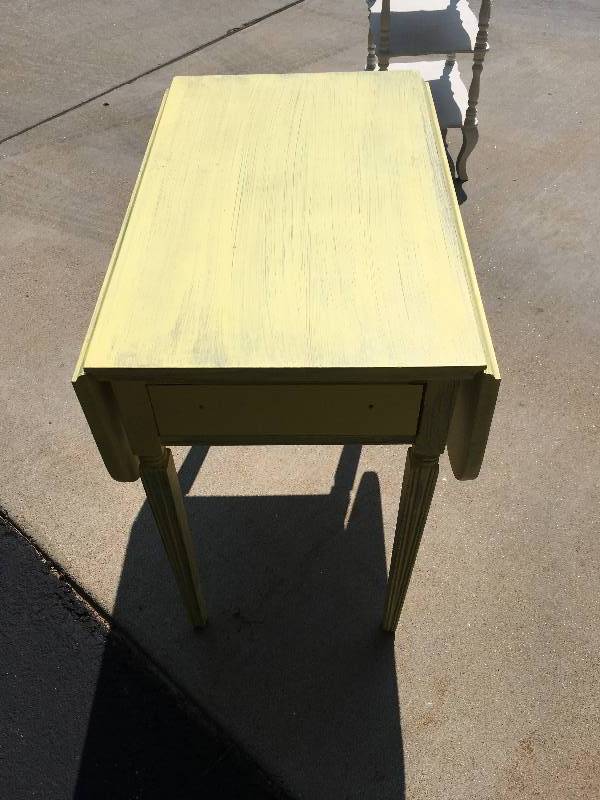 lot 255 image: YELLOW WOOD TABLE WITH FOLDING SIDES