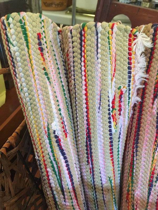 lot 167 image: (4) MULTI-COLORED PLACE MATS WITH WOVEN BASKET