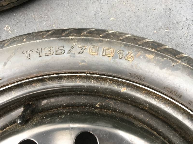 lot 449 image: (2) TRAILER TIRES, (1) SPARE TIRE, (2) MIRROR EXTENDERS, (2) FLOOR MATS, AND (1) STRAP.