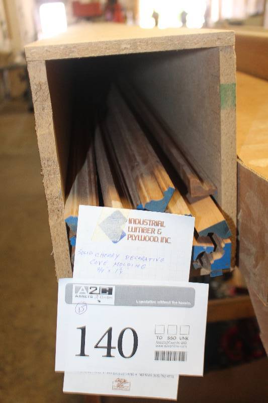 lot 140 image: Lot of (15) Solid Cheery Wood Decorative Cove Mouldings