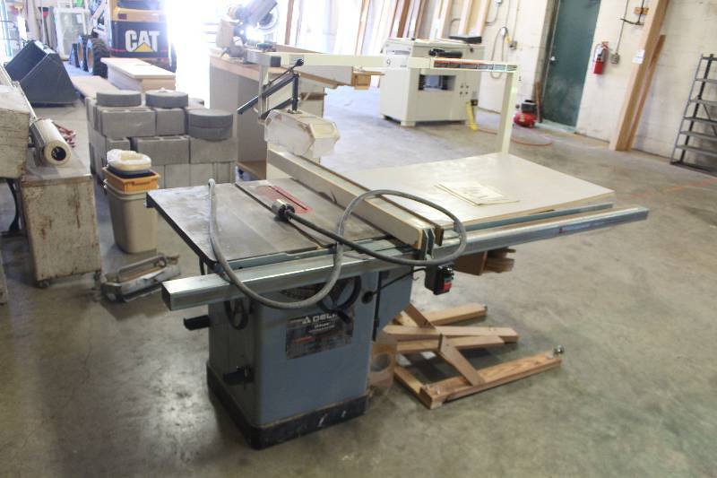 lot 9 image: Delta Unisaw 10in. Tilting Arbor Saw