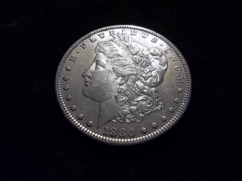 1880 S Morgan Silver Dollar Very High Grade MS (In MS63 Valued  $190.00)