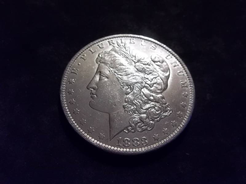 1883 O Morgan Silver Dollar High Grade MS (In MS60 $70.00)