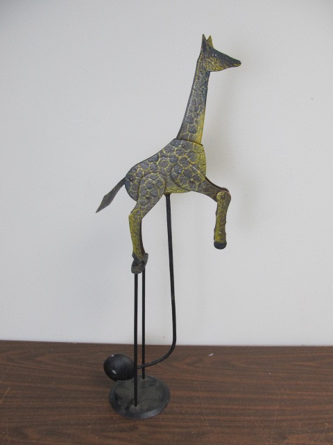 lot 37 image: Painted Metal Balancing Giraffe 