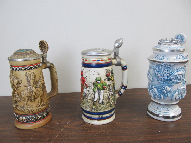 lot 39 image: Lot of 3 Sports Related Beer Steins