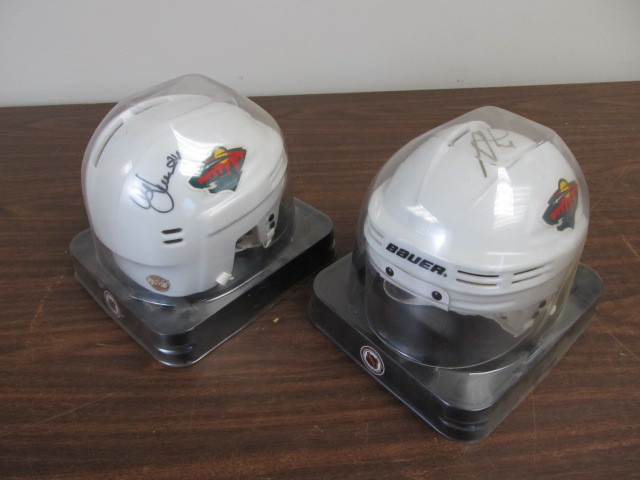 lot 67 image: Marian Gaborik & Antti Laaksonen Signed Mini Helmets