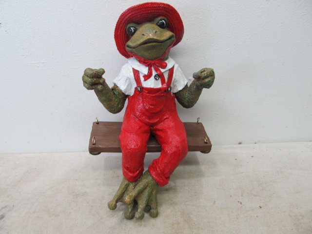 lot 140 image: Frog on Swing Yard Ornament