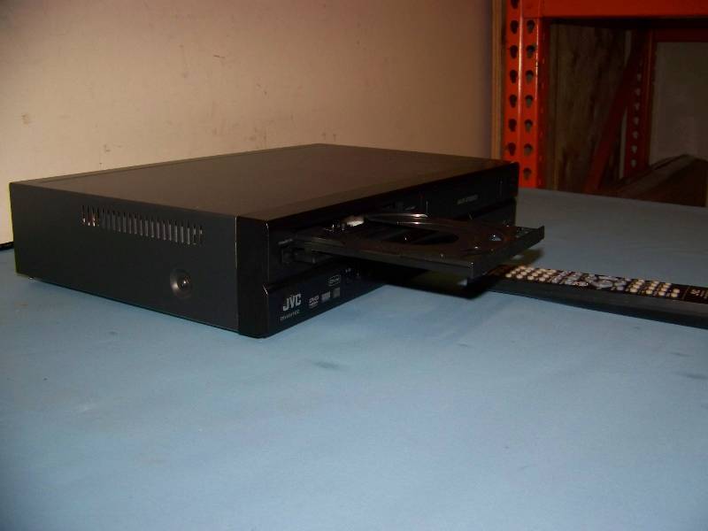 lot 73 image: JVC, DVD  VCR Combo Recorder  Player with Remote Control