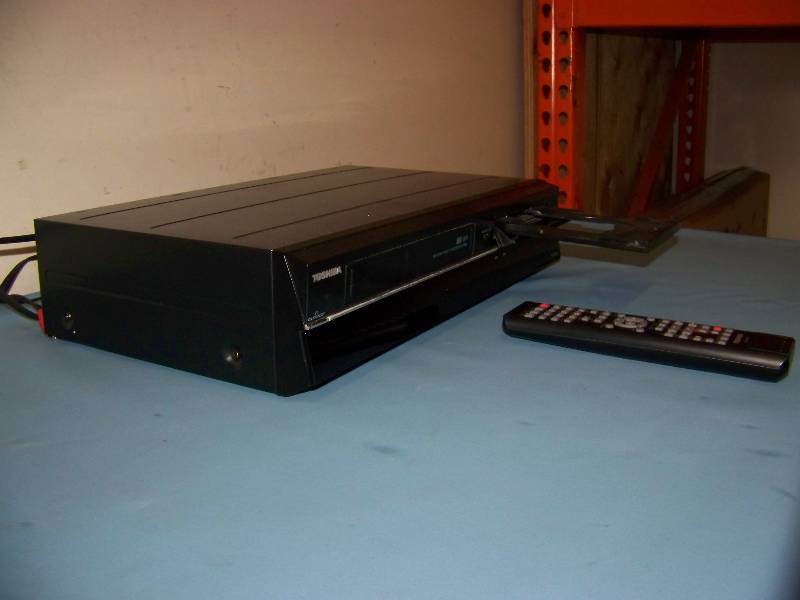 lot 75 image: Toshiba, DVD  Video Cassette Recorder  Player with Remote Control in Original Box