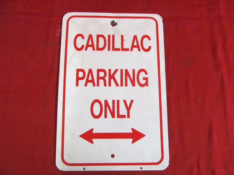 lot 63 image: metal sign