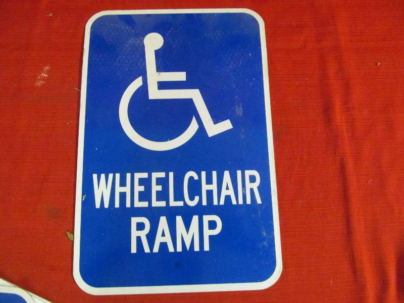 lot 66 image: metal sign