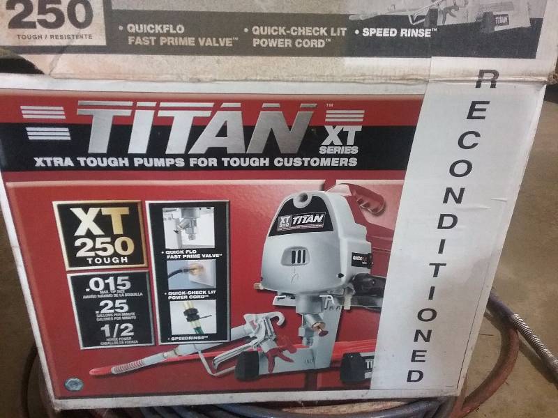 lot 74 image: Titan XT 250 Sprayer wExtra Hose (used 1x) & air hose